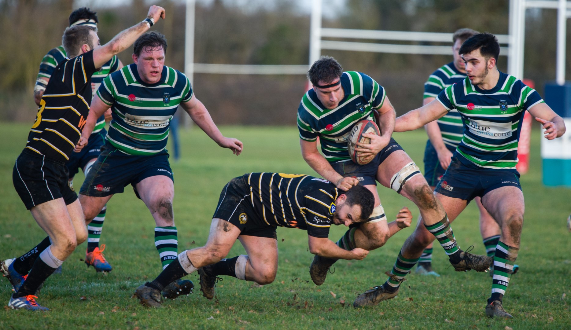 Treacle Knights carries the ball on his 100th appearance for Abbey